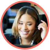 Customer service woman wearing a headset laughing while on a customer support call