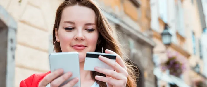 woman_smiling_down_at_phone